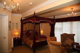 Queen Anne king-size four poster 