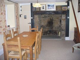 Dining room with huge fire place 