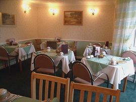  Dining room with patio doors into the garden.    