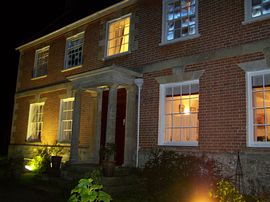 Rollestone Manor by night 